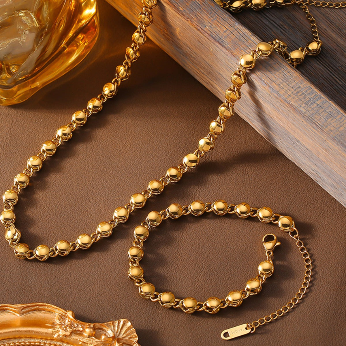 18K gold plated necklace and matching bracelet set with round linked design by Trendsi