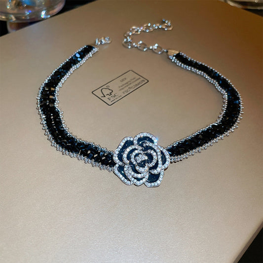 Trendsi alloy flower statement necklace with black and silver rhinestone design