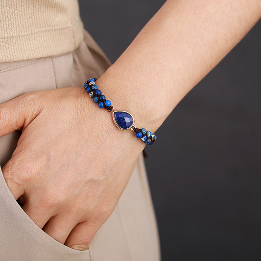 Trendsi blue gemstone teardrop bracelet with polished beads worn on wrist