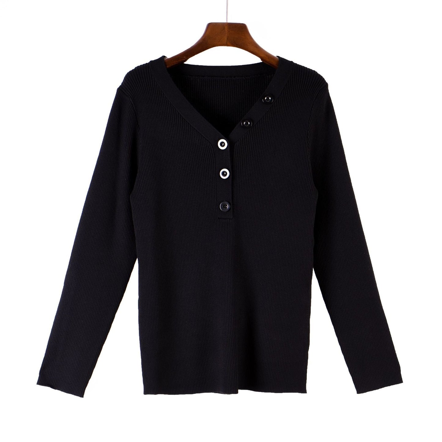 Black button v-neck knit sweater for curvy women with long sleeves on wooden hanger