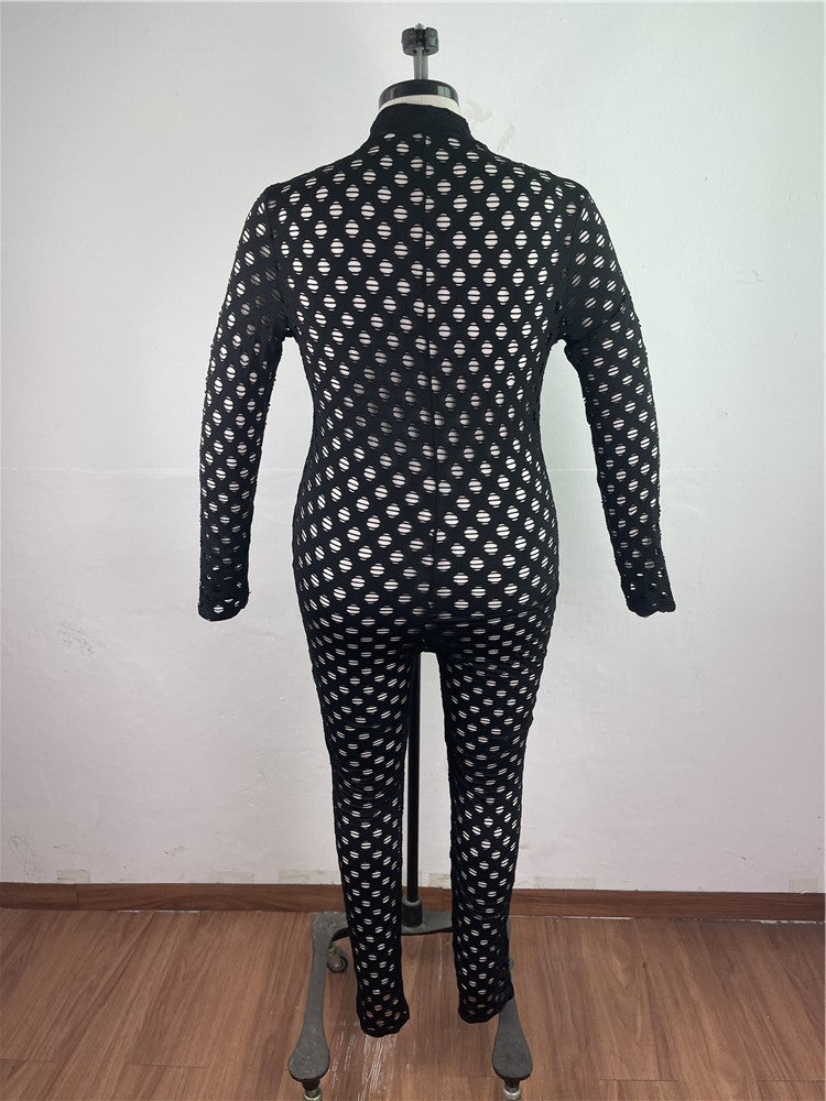 Back view of black and white patterned curvy women zip front jumpsuit on mannequin