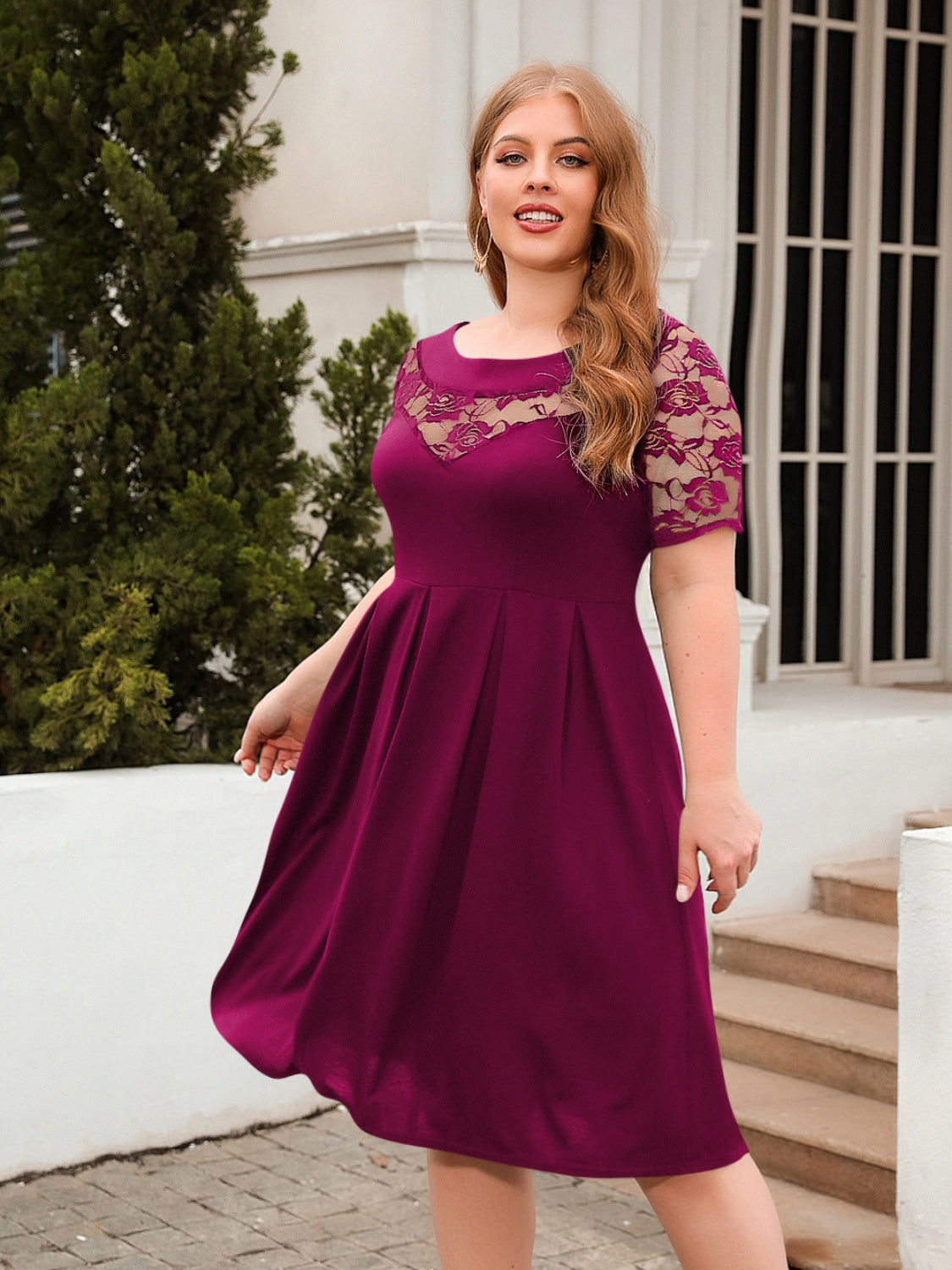 Plus size ruched round neck dress with lace sleeves in deep purple, knee-length and flattering fit