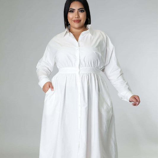 Plus size woman wearing a white long sleeve button-down fashionable plus size dresses for women