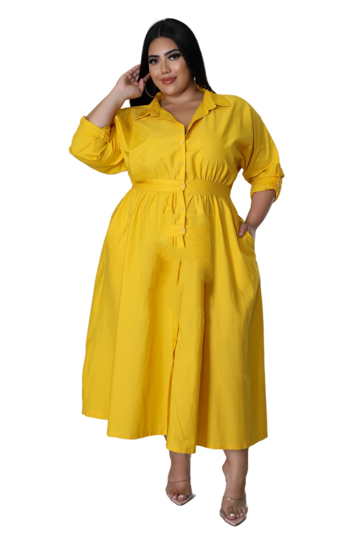 Plus size woman wearing a yellow button-up midi dress showcasing fashionable plus size dresses for women