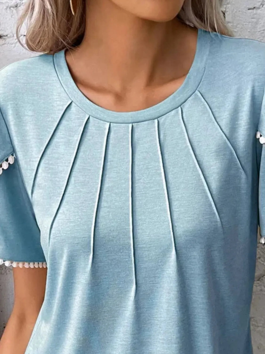 Light blue full size round neck top for women with pleated front and decorative sleeve trim