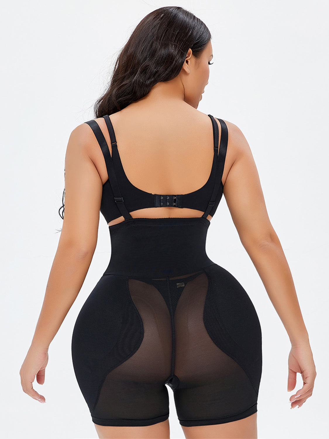 Back view of a woman wearing a black full size shaping bodysuit for women with adjustable straps