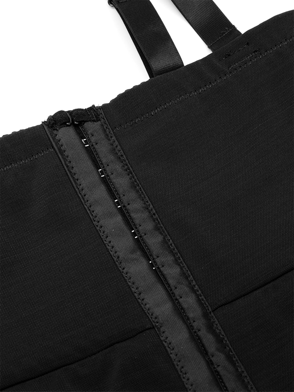 Close-up of black full size shaping bodysuit for women with zipper and adjustable straps