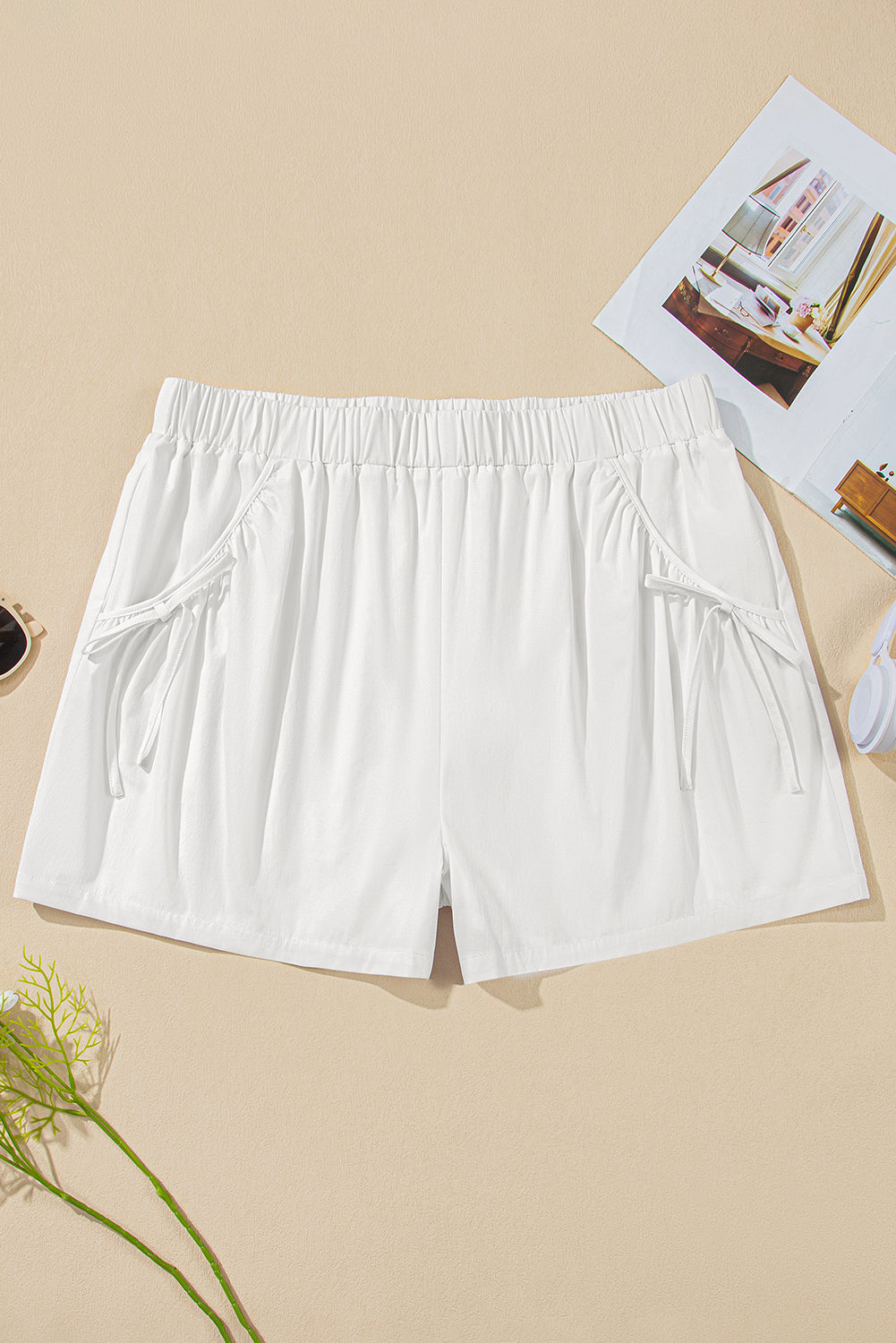 kjplussizefashion plus size white shorts with pockets featuring elastic waistband and side ties