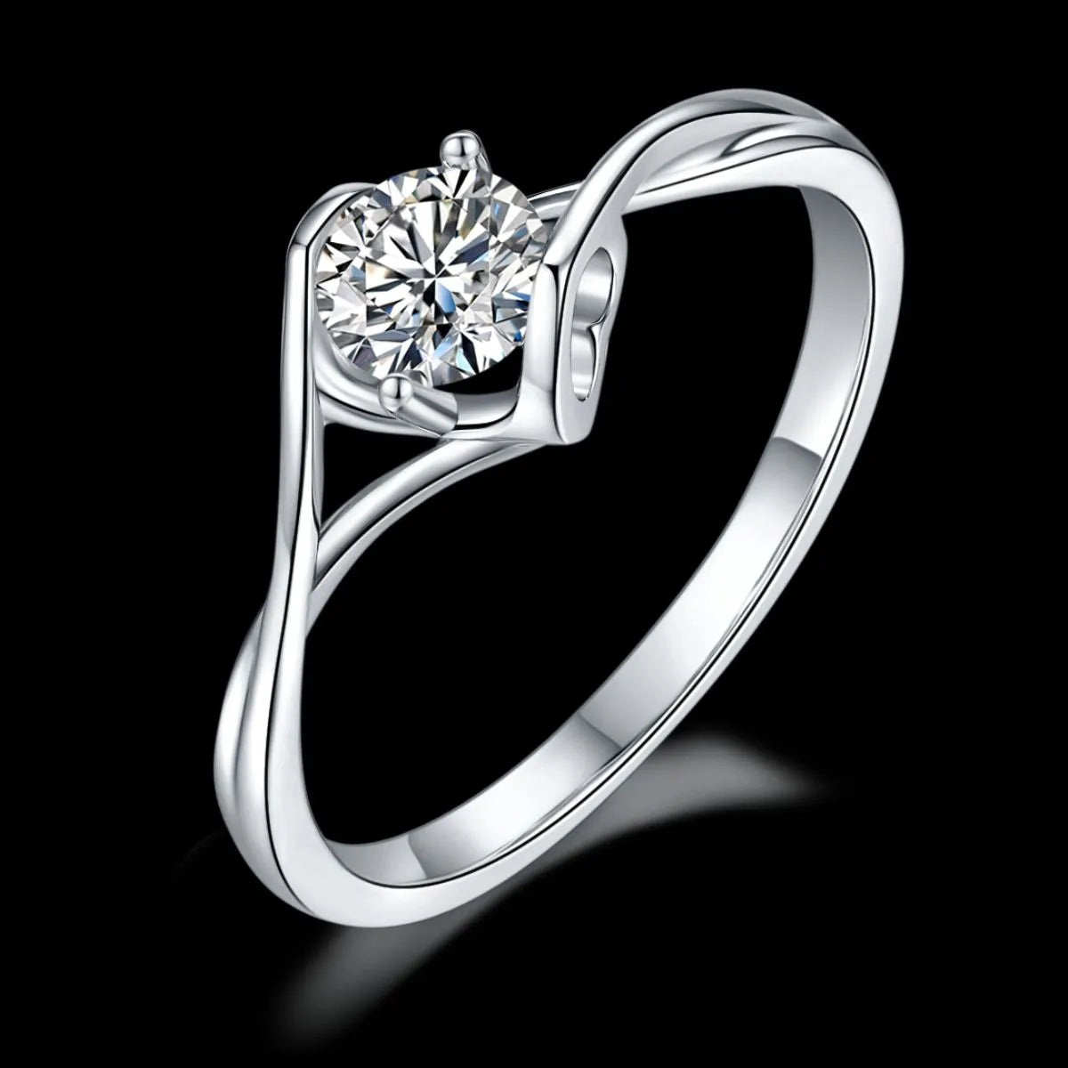 Elegant moissanite sterling silver ring with a sparkling round center stone on a twisted band