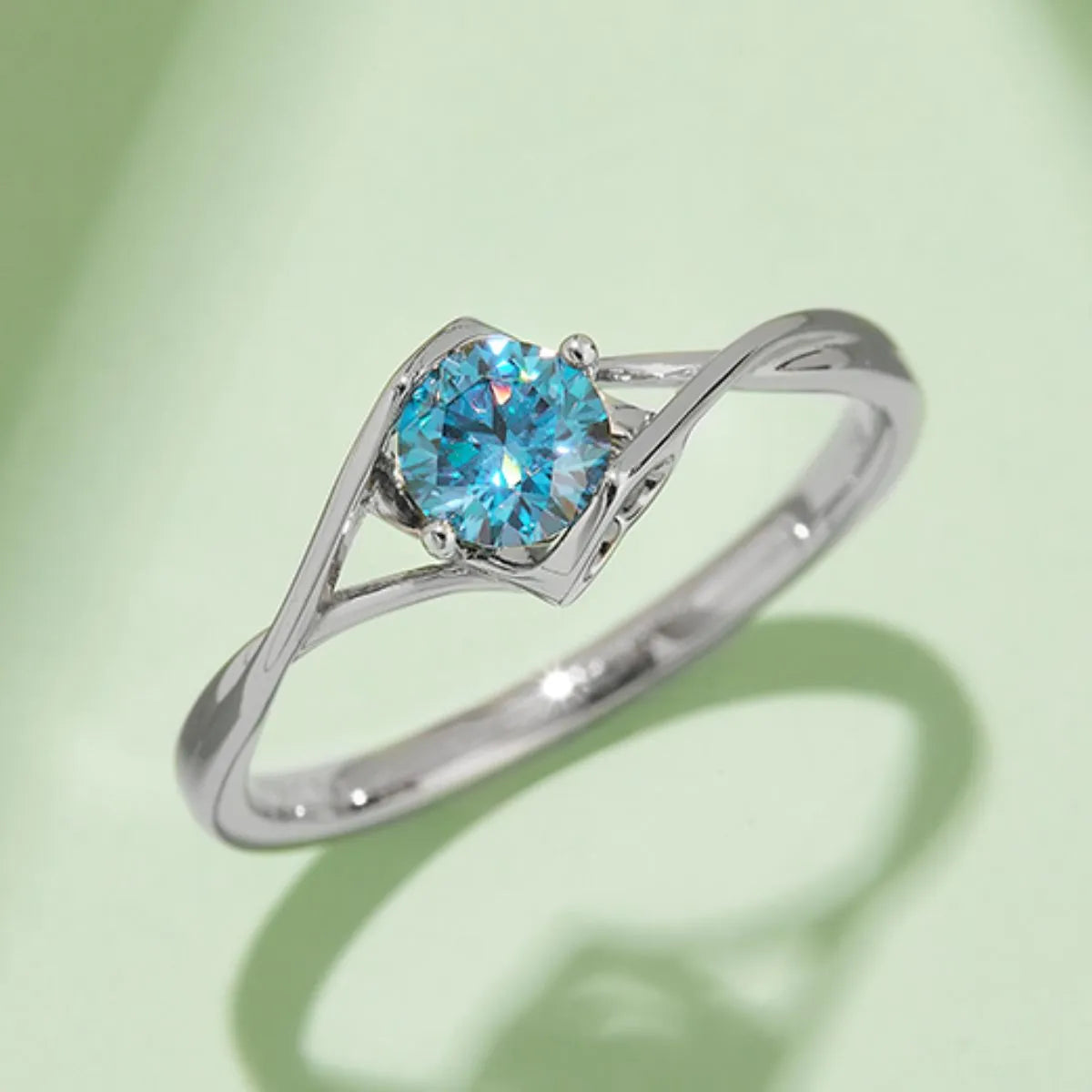 Trendsi moissanite sterling silver ring with a sparkling round blue gemstone and elegant band design