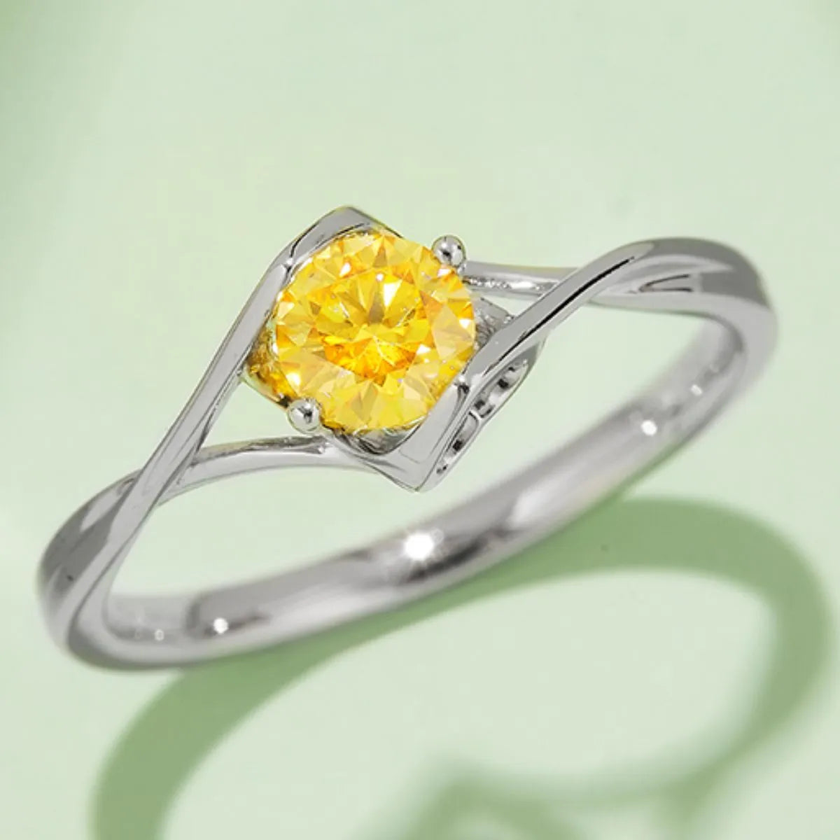 Trendsi yellow moissanite sterling silver ring with twisted band design and cushion-cut stone