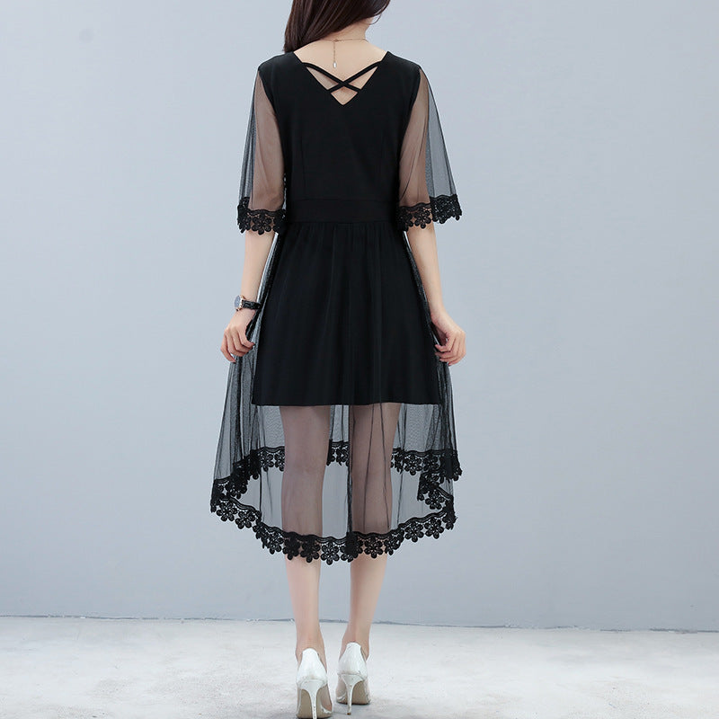 Back view of plus size black mid-length dress with sheer sleeves and floral lace trim
