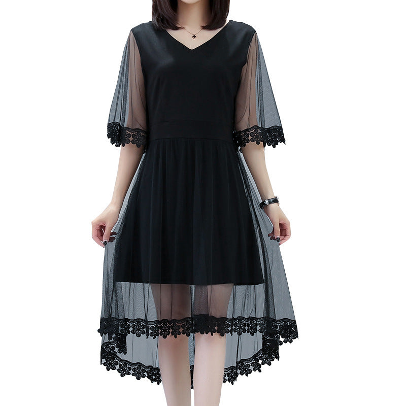 Plus size black mid-length dress with sheer lace sleeves and hem detail