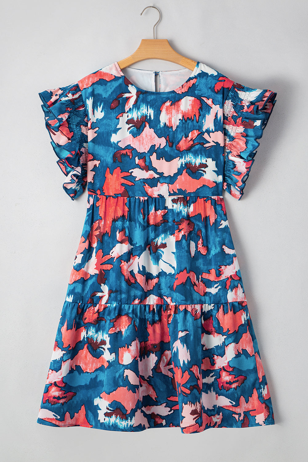 kjplussizefashion plus size blue abstract mini dress with ruffled sleeves and vibrant pattern