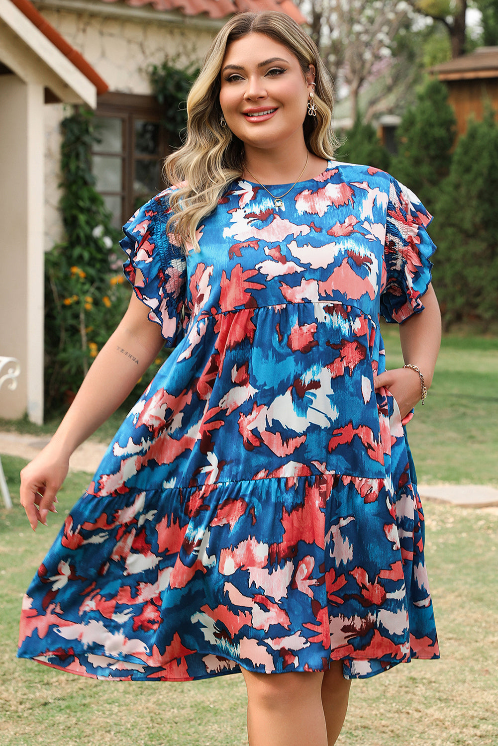Plus size blue abstract mini dress with ruffled sleeves and tiered skirt by kjplussizefashion