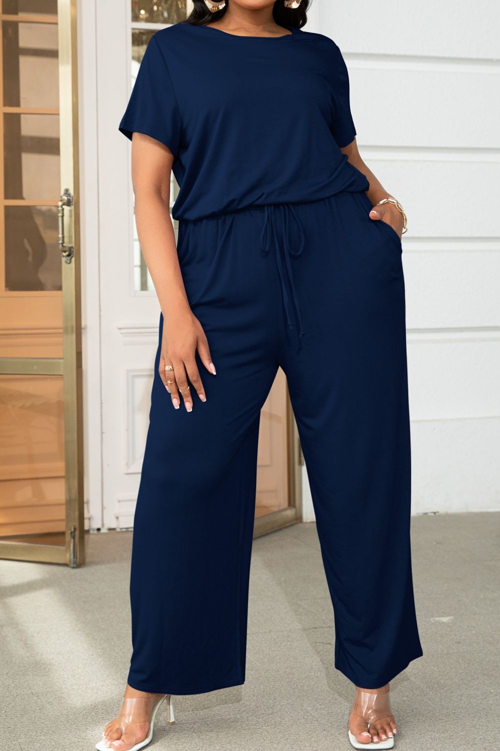 Trendsi plus size casual jumpsuit in navy blue with short sleeves and drawstring waist