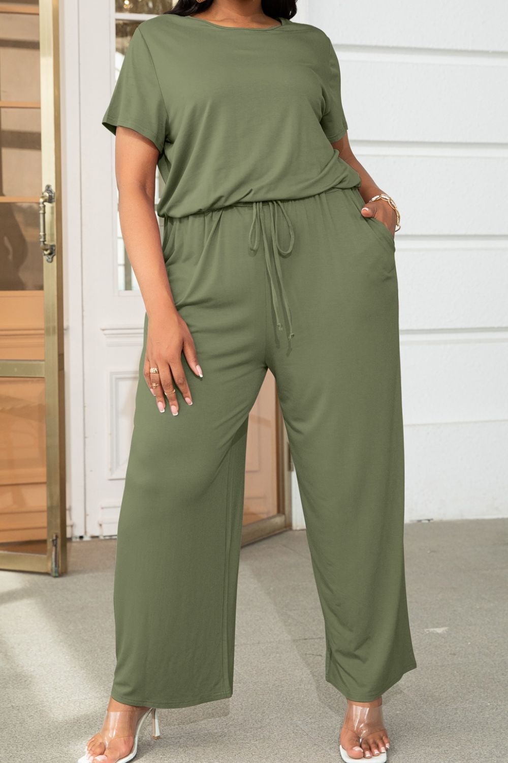 Trendsi plus size casual jumpsuit in olive green with short sleeves and drawstring waist