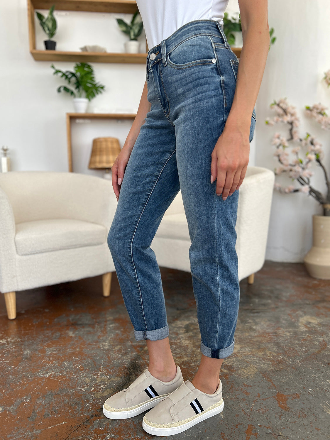 Trendsi plus size cuffed hem jeans in medium blue denim styled with casual white sneakers