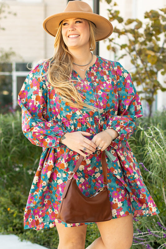 Plus size sky blue floral print shirred ruffle tiered mini dress with long sleeves and casual fit