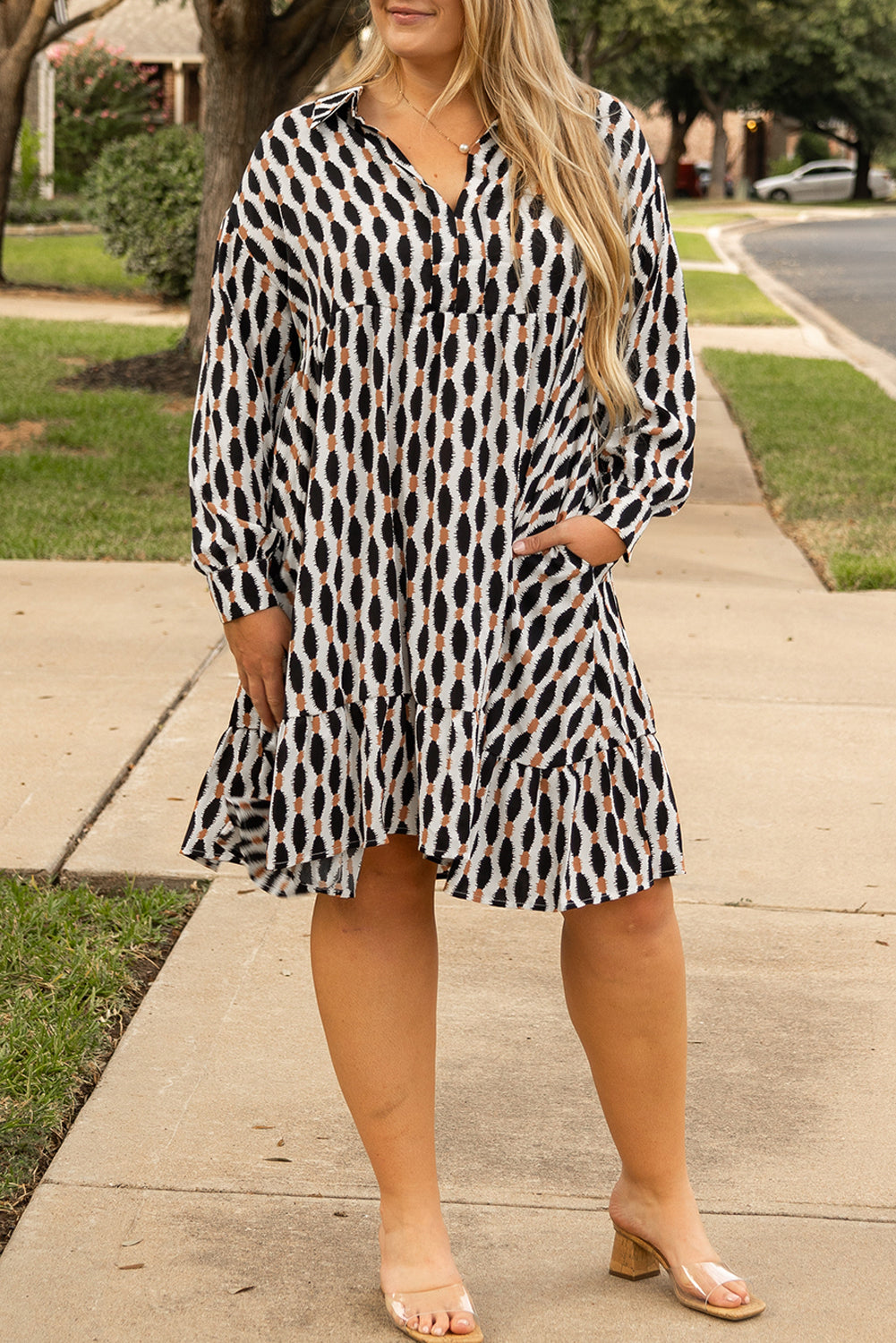 Plus size geometric print mini dress with long sleeves and a relaxed fit by kjplussizefashion