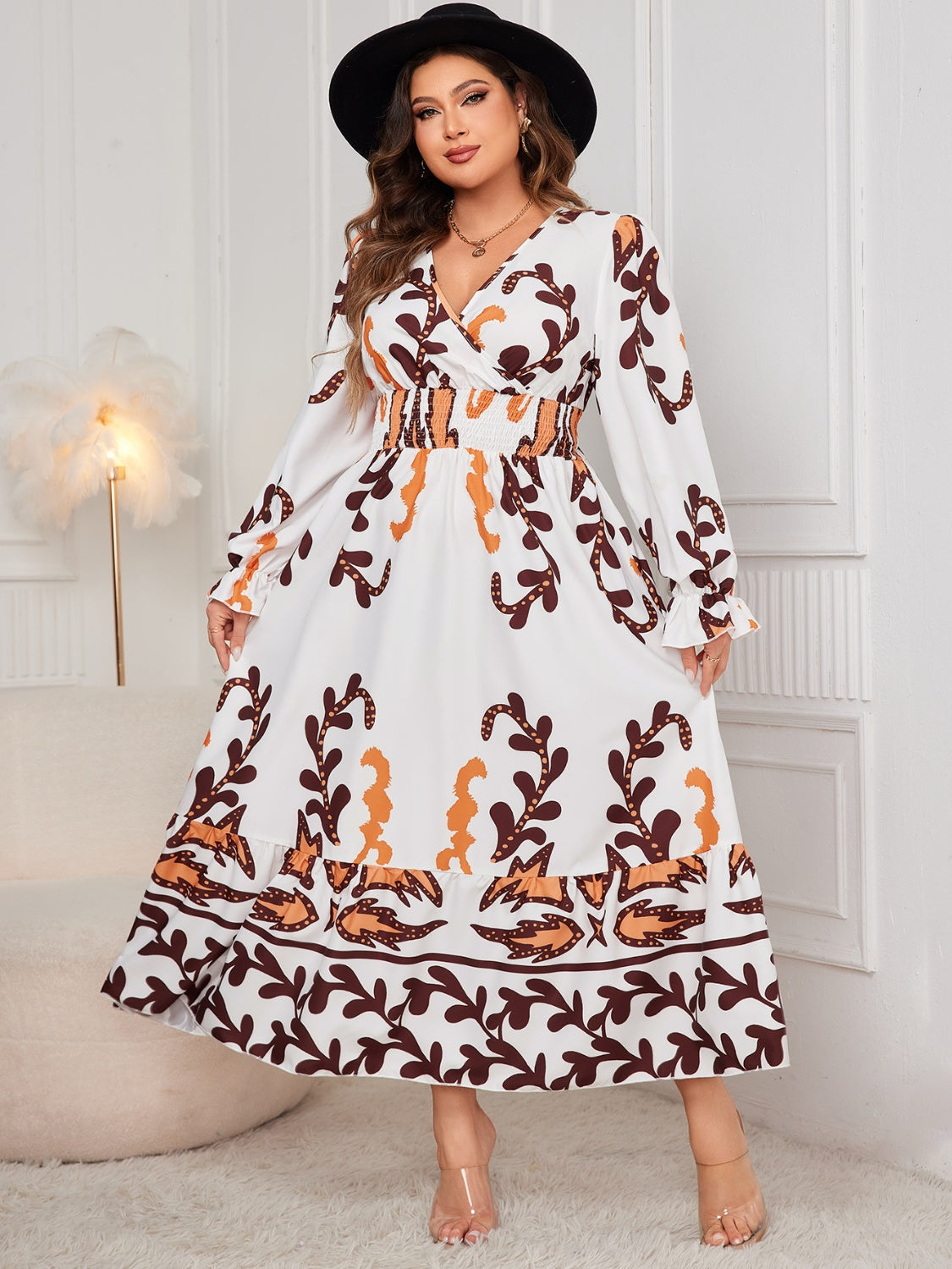 Plus size honey print dress for women with long sleeves and a flowing skirt in white and brown tones
