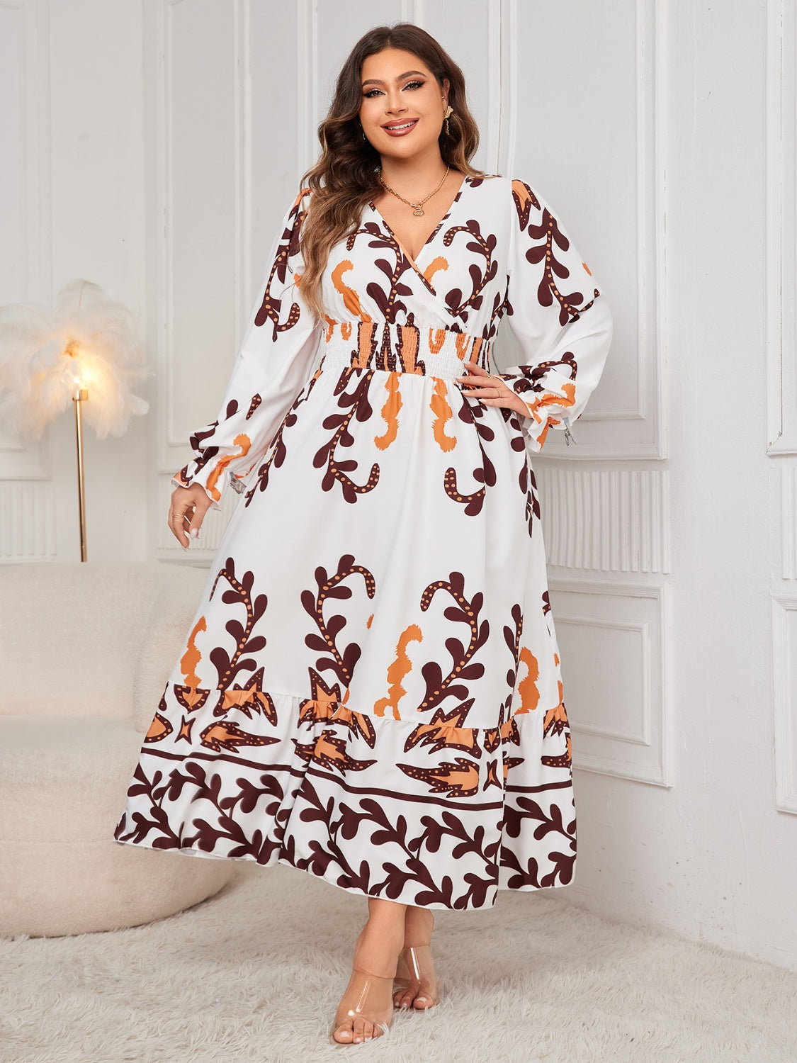 Plus size honey print dress for women featuring long sleeves and a flowing maxi silhouette
