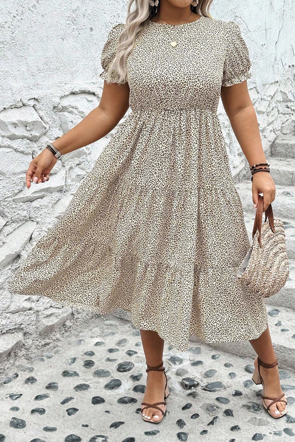 Plus size leopard print dress from kjplussizefashion with puff sleeves and midi length flowy skirt