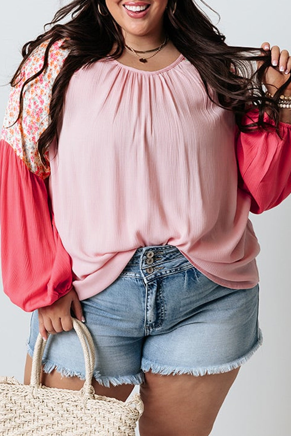Plus size pink contrast blouse with floral patchwork long sleeves and relaxed fit