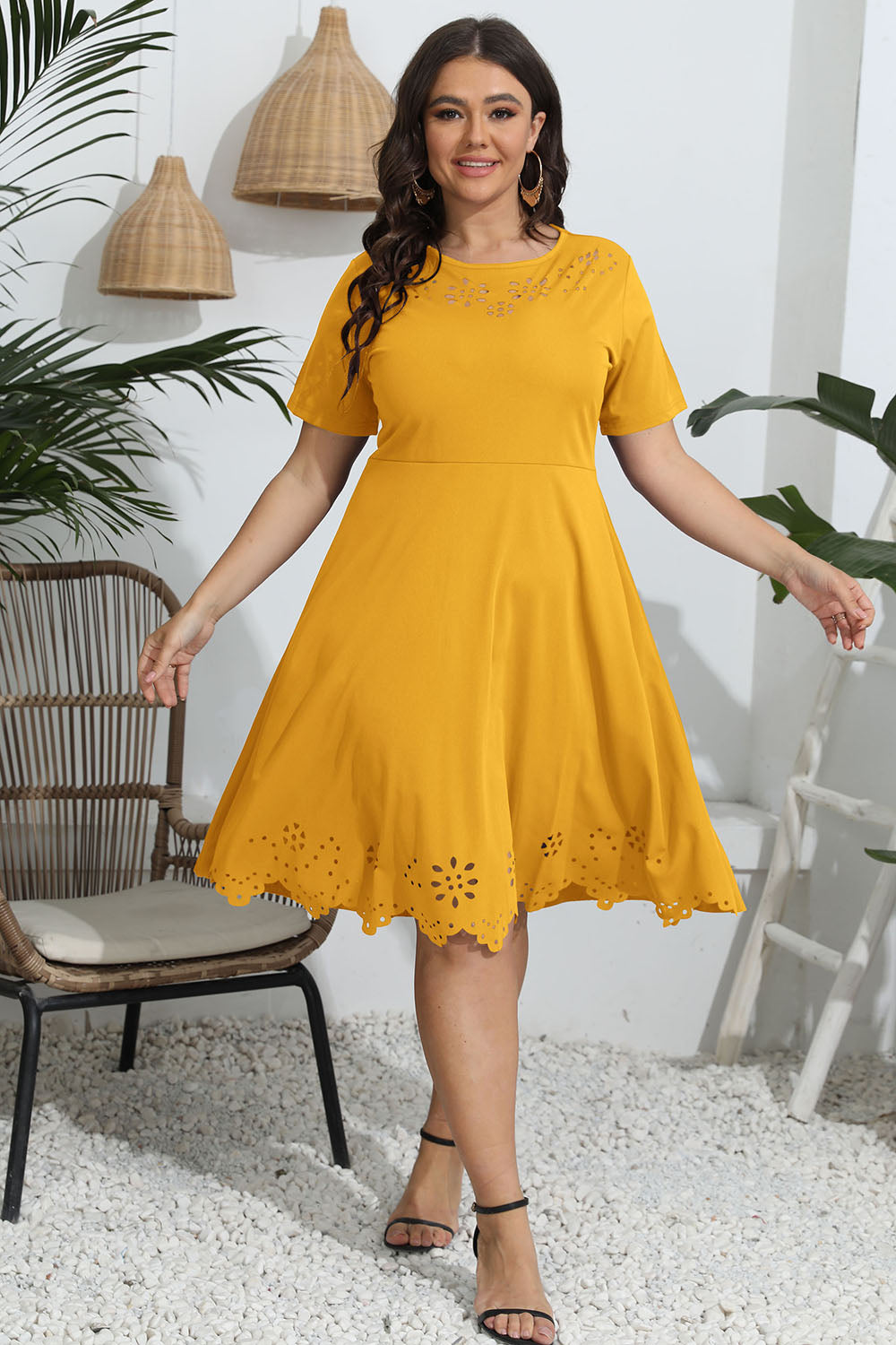 Trendsi plus size round neck openwork dress in mustard yellow with floral cutout details and short sleeves