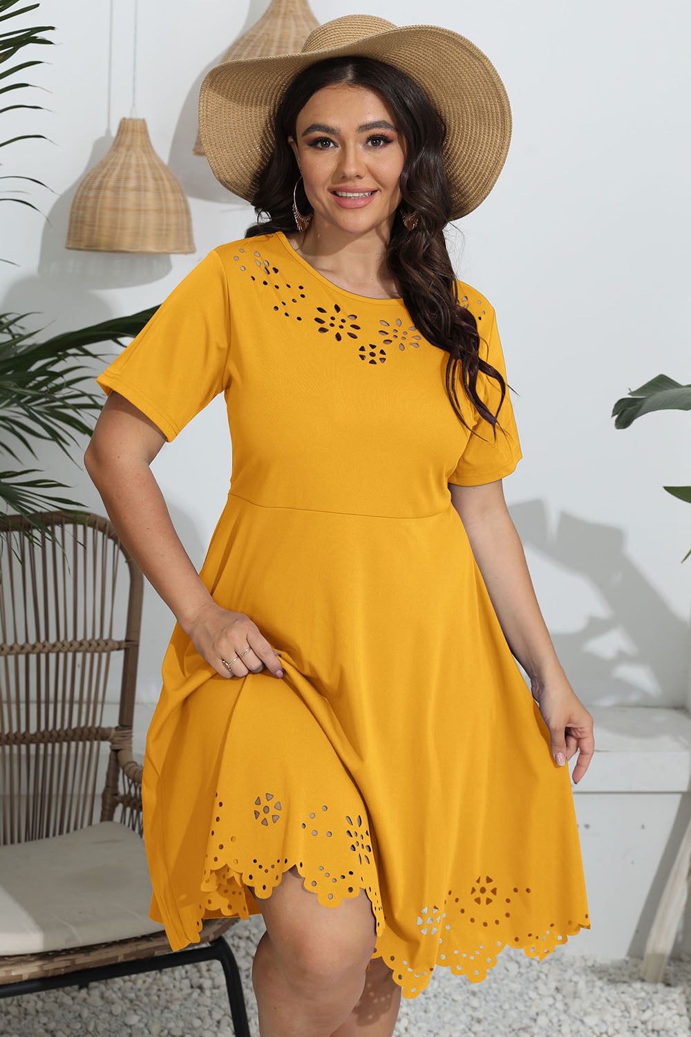 Yellow plus size round neck openwork dress with short sleeves and floral cutout details
