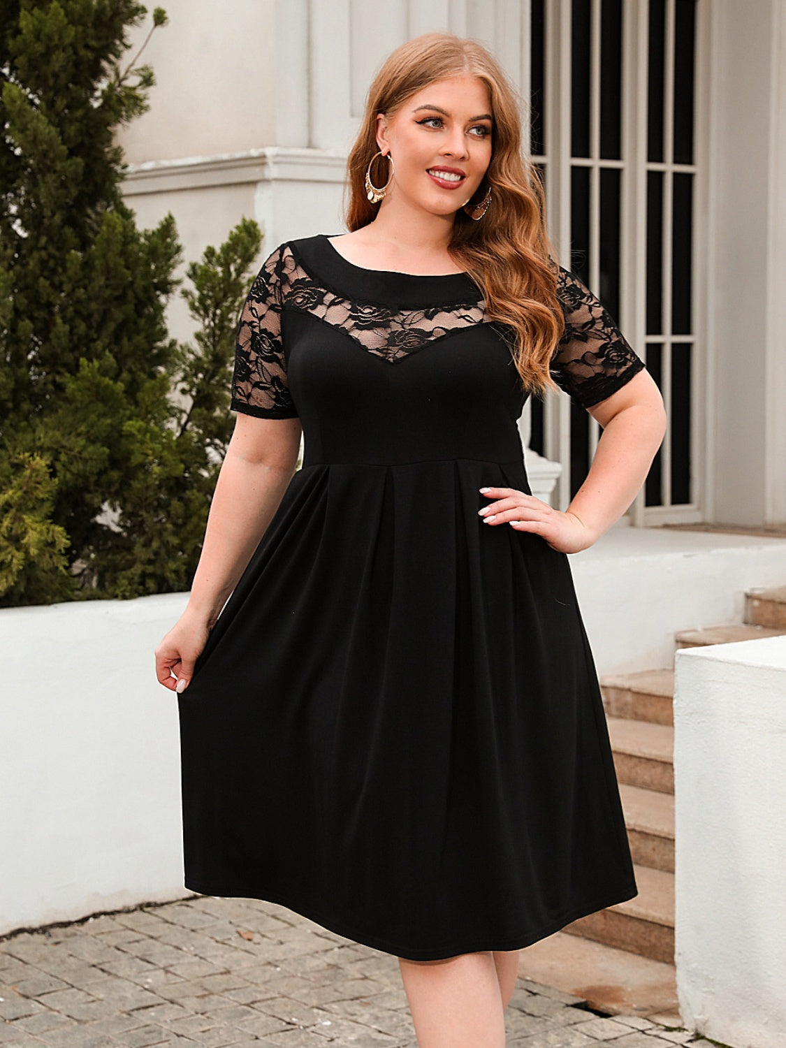 Trendsi plus size ruched dress in black with lace details on the sleeves and neckline