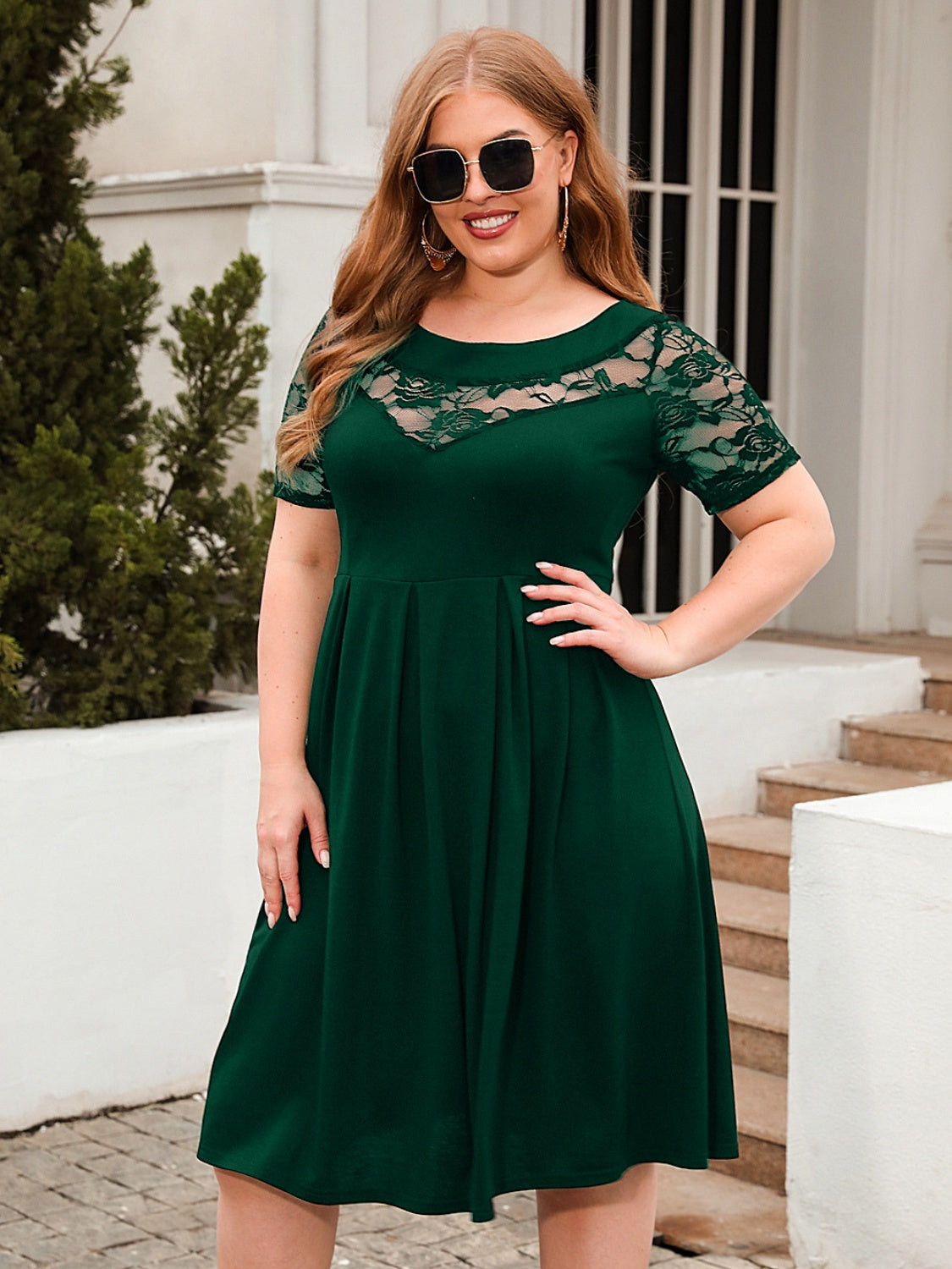 Trendsi plus size ruched dress in dark green with lace sleeves and neckline detail