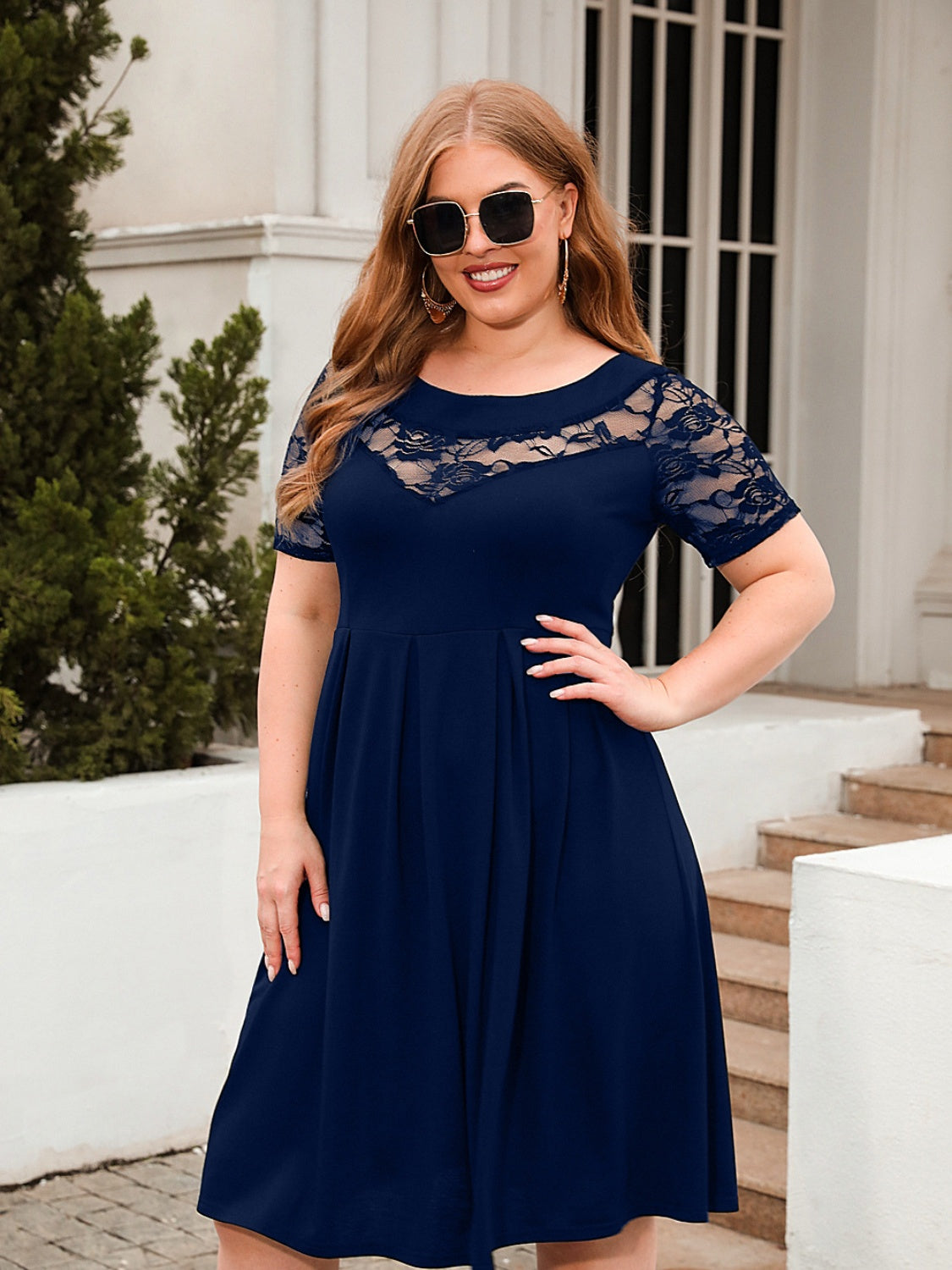 Trendsi plus size ruched dress in navy blue with lace short sleeves and a flattering fit