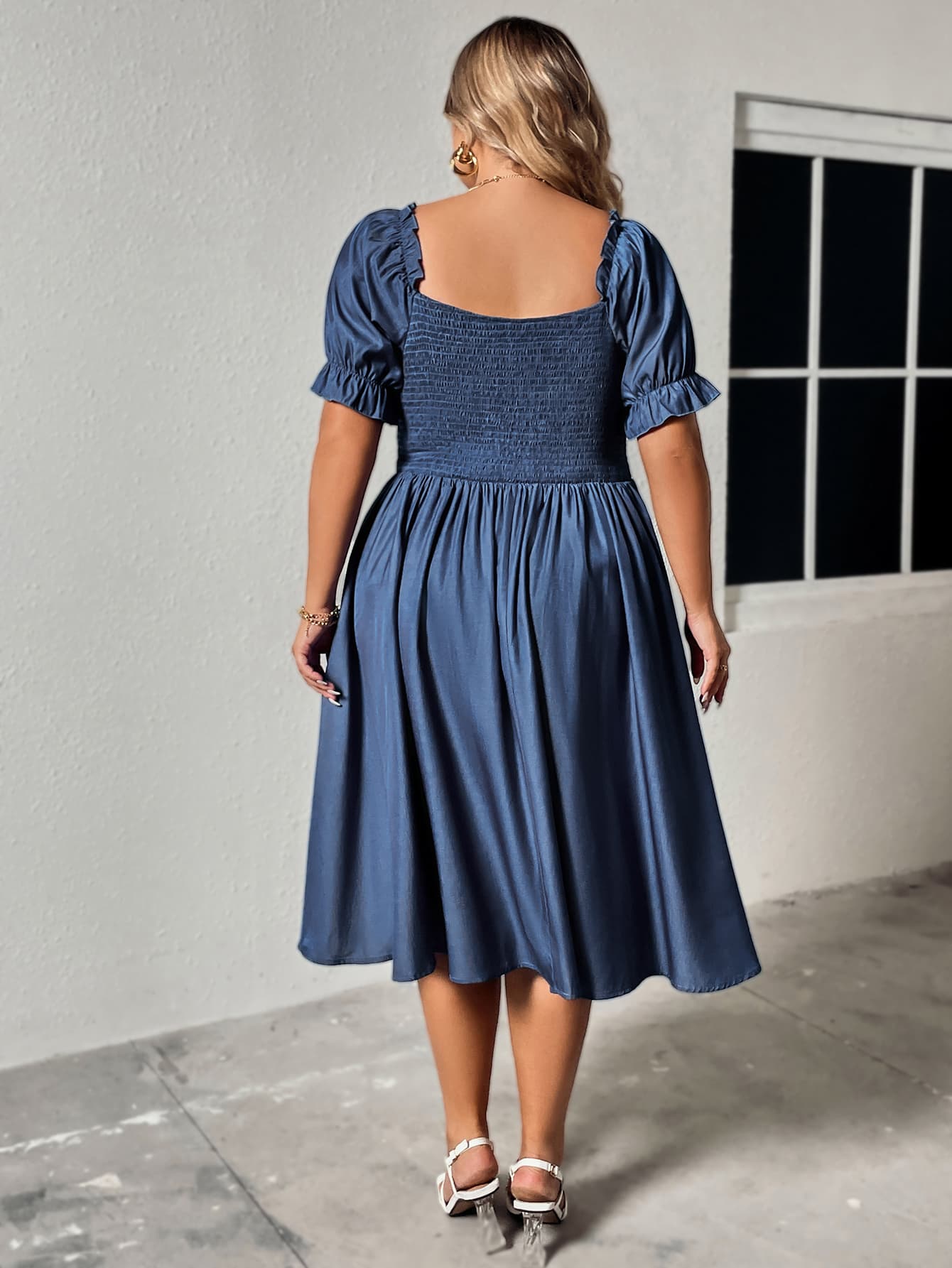 Trendsi plus size ruched sweetheart dress in blue with puff sleeves and gathered waist, shown from the back