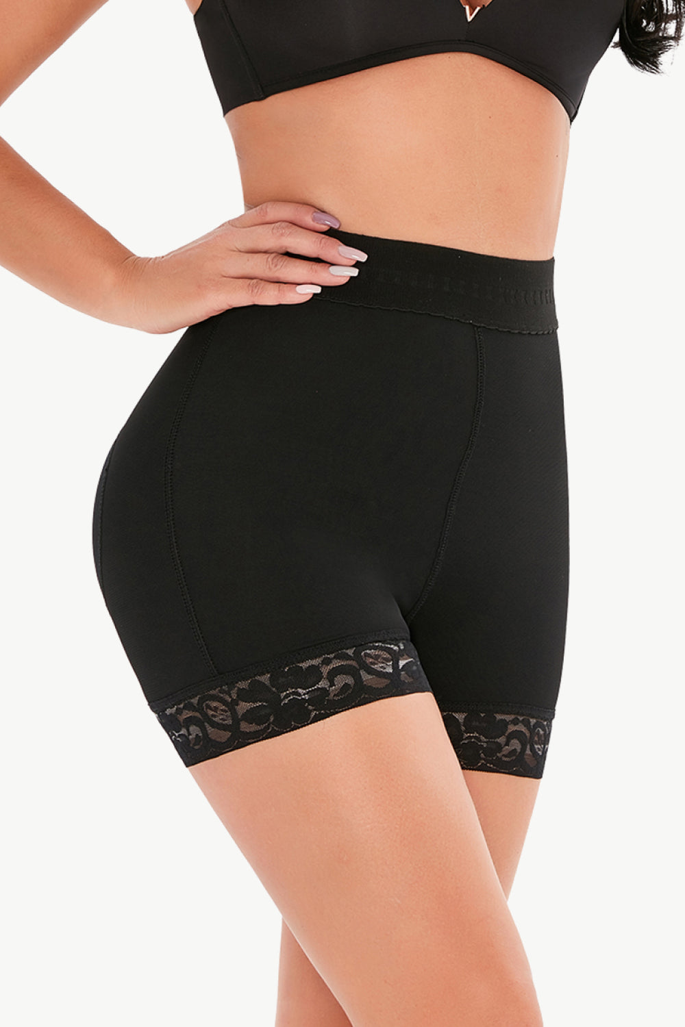 Trendsi black plus size shaping shorts with high waist and lace trim on thighs