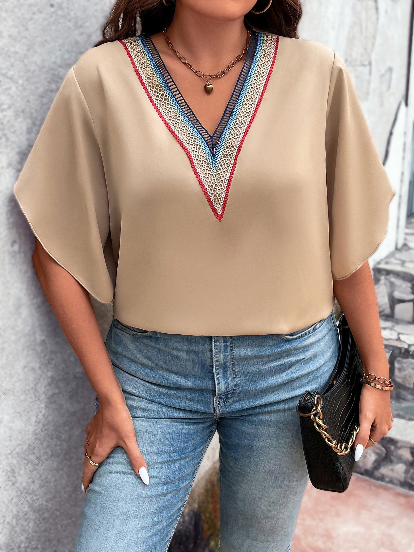 Trendsi plus size v-neck blouse in beige with colorful embroidered detail and loose sleeves