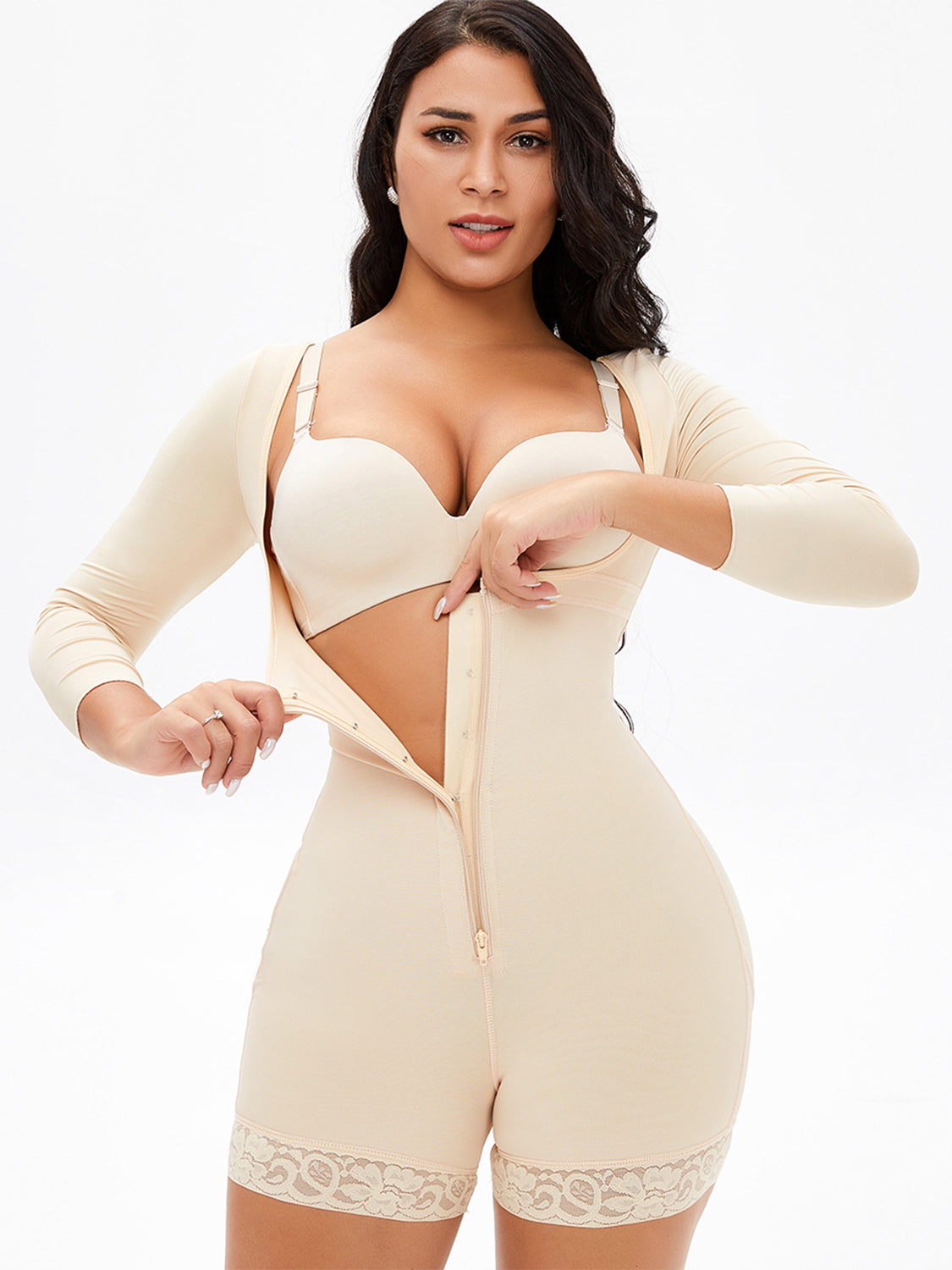Trendsi plus size zip up shapewear in beige with long sleeves and lace trim on model