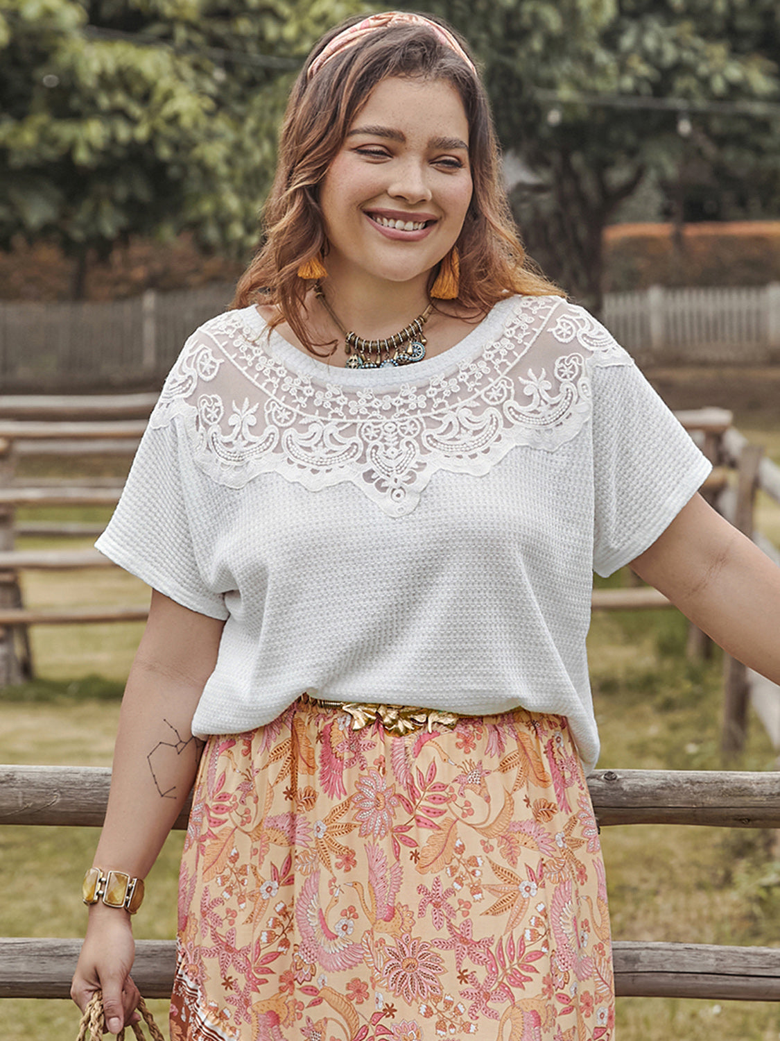 Trendsi round neck short sleeve plus size blouse in white with lace detailing worn outdoors