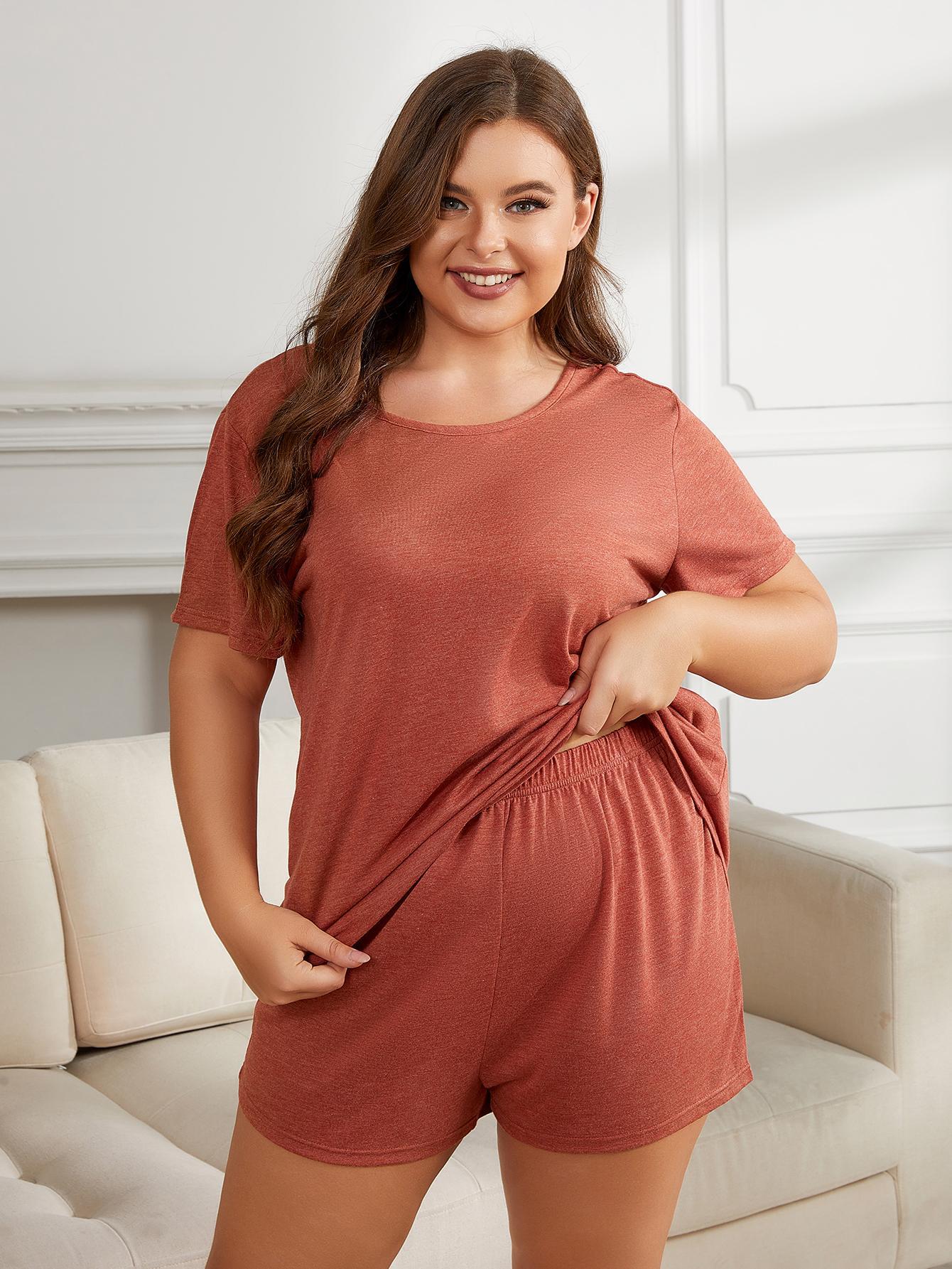 round neck short sleeve plus size pajamas in soft rust color worn by smiling woman