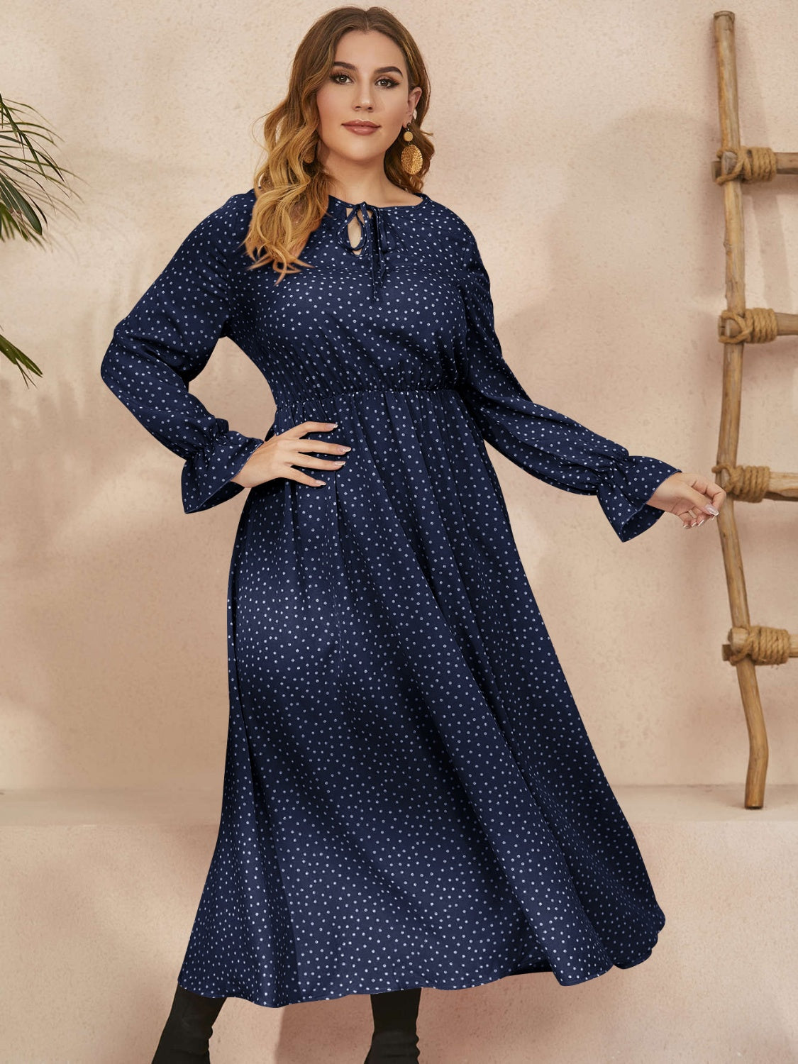 Honey Plus Size navy polka dot ruffled long sleeve dress with defined waist and elegant hemline