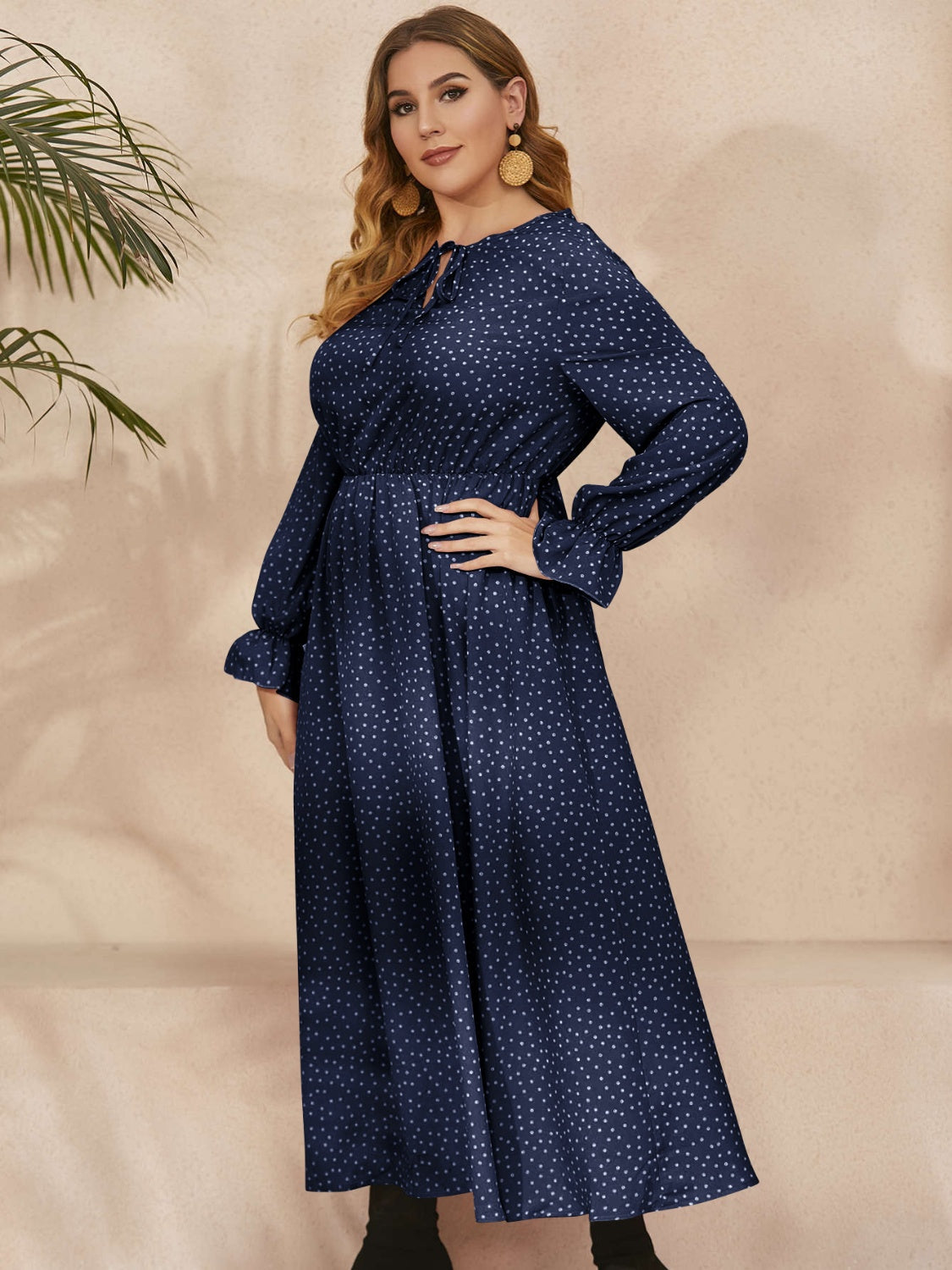 Honey Plus Size navy polka dot ruffled long sleeve dress with defined waist and soft fabric