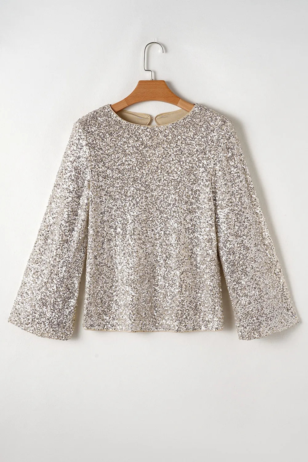 Trendsi silver sequin open back dressy blouse plus size with long sleeves on hanger