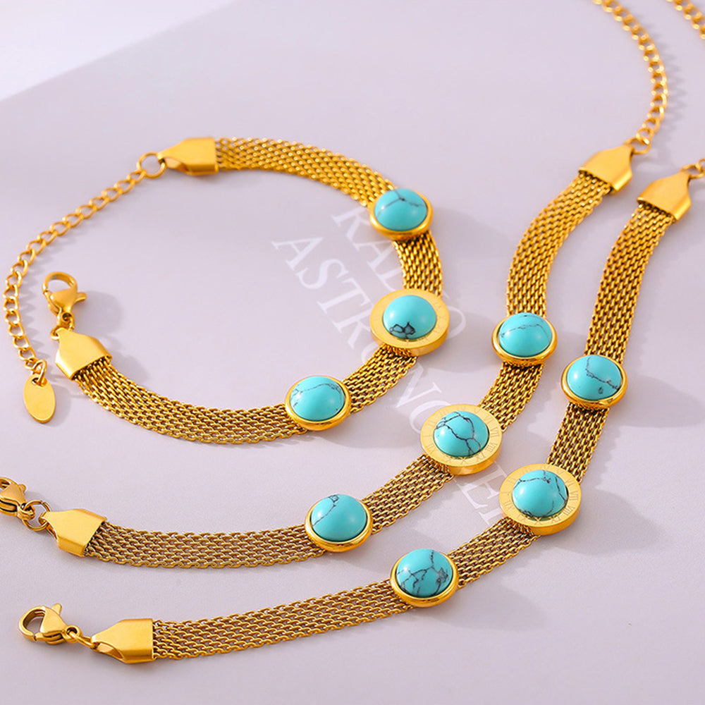 Turquoise titanium steel bracelet set with gold mesh chain and oval turquoise stones by Trendsi
