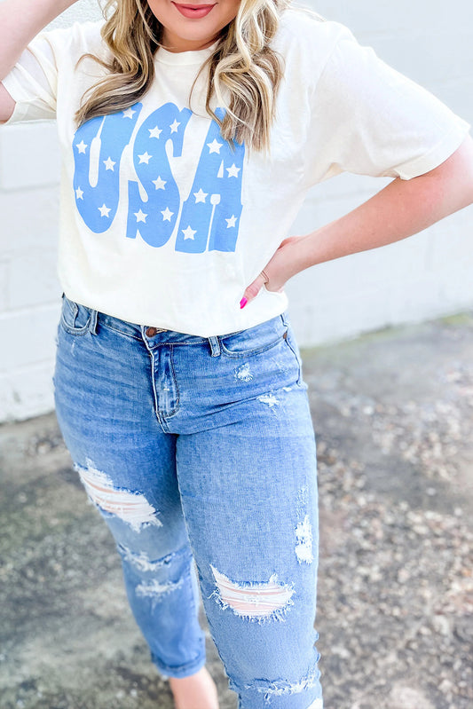 kjplussizefashion sky blue USA graphic plus size tee worn with distressed blue jeans