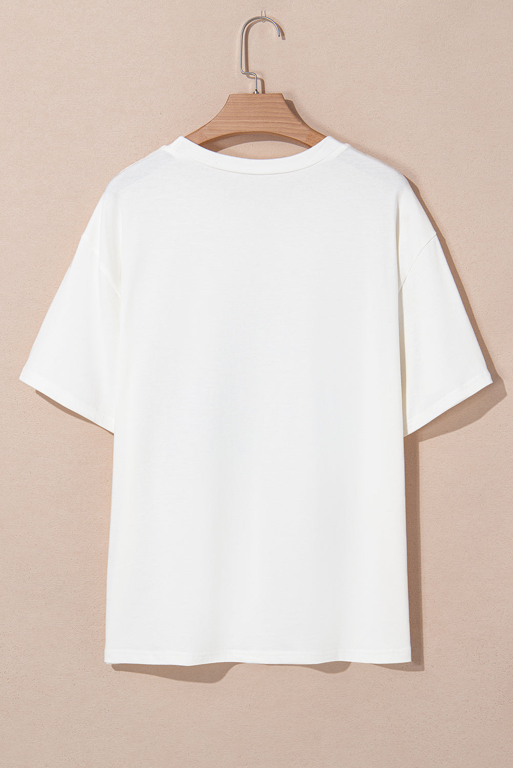 White plus size tee shown from back on wooden hanger by kjplussizefashion for sky blue USA graphic plus size tee