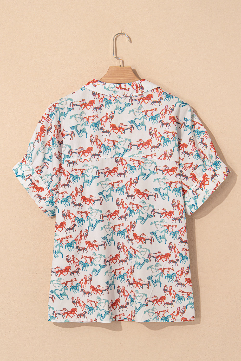 Back view of split neck western plus size top with colorful horse print by kjplussizefashion