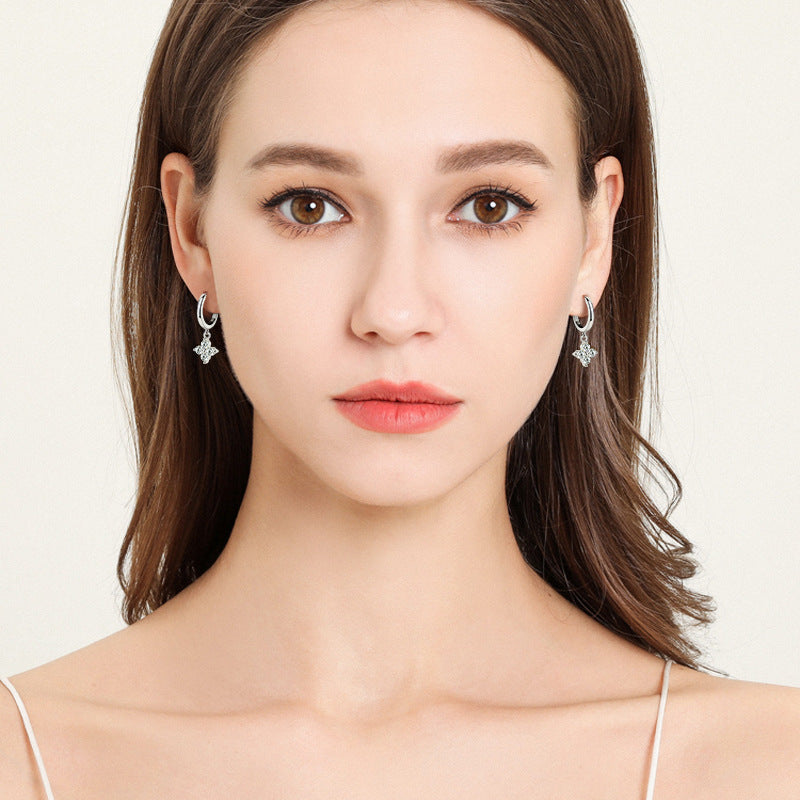 Trendsi sterling silver drop earrings for women worn by model with minimalist makeup and natural hair