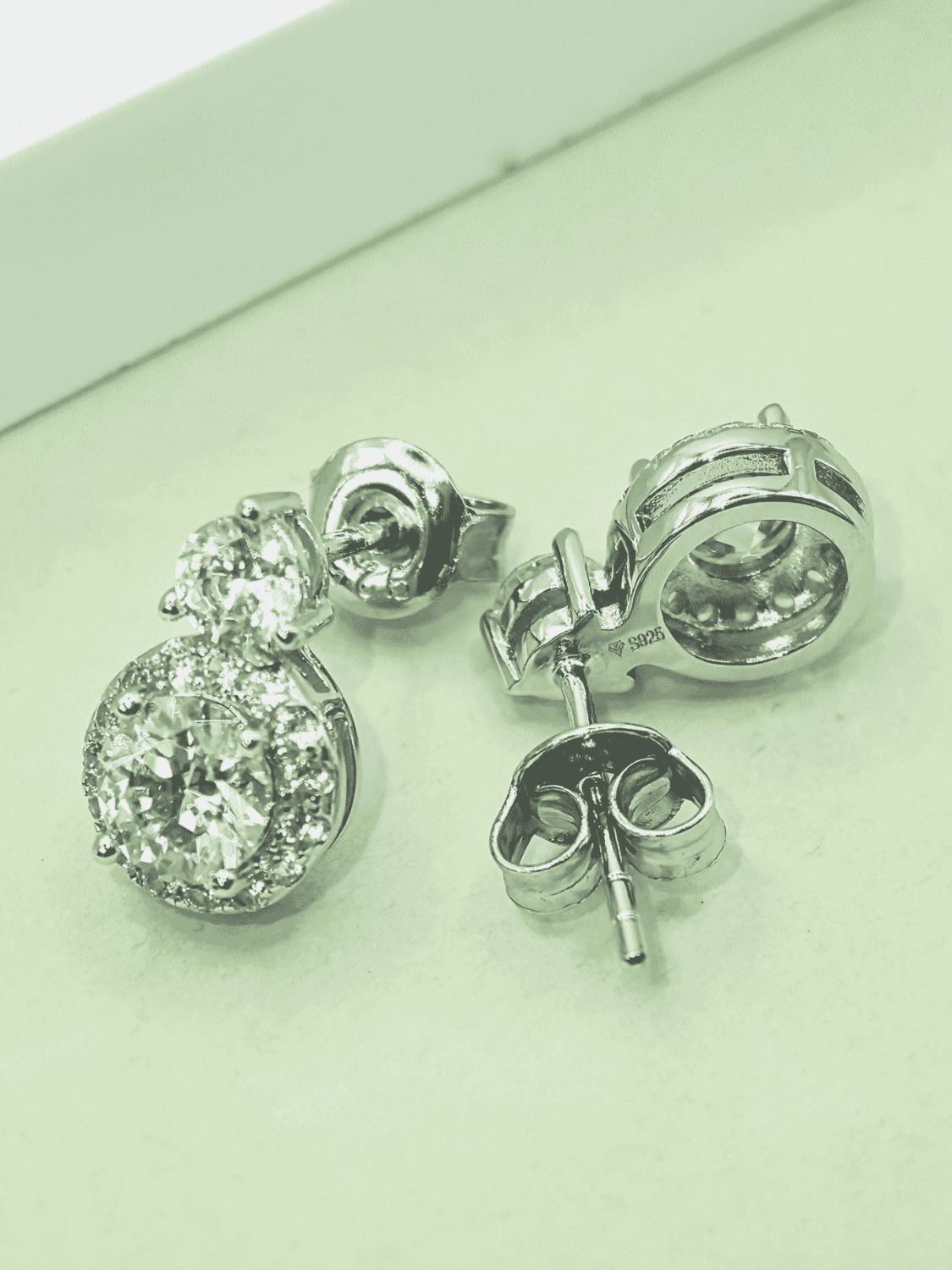 Trendsi sterling silver moissanite studs with round sparkling stones and secure butterfly backs