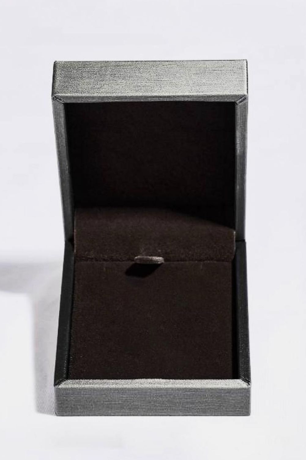 Empty gray jewelry box for 20 carat moissanite pendant necklace with soft black interior