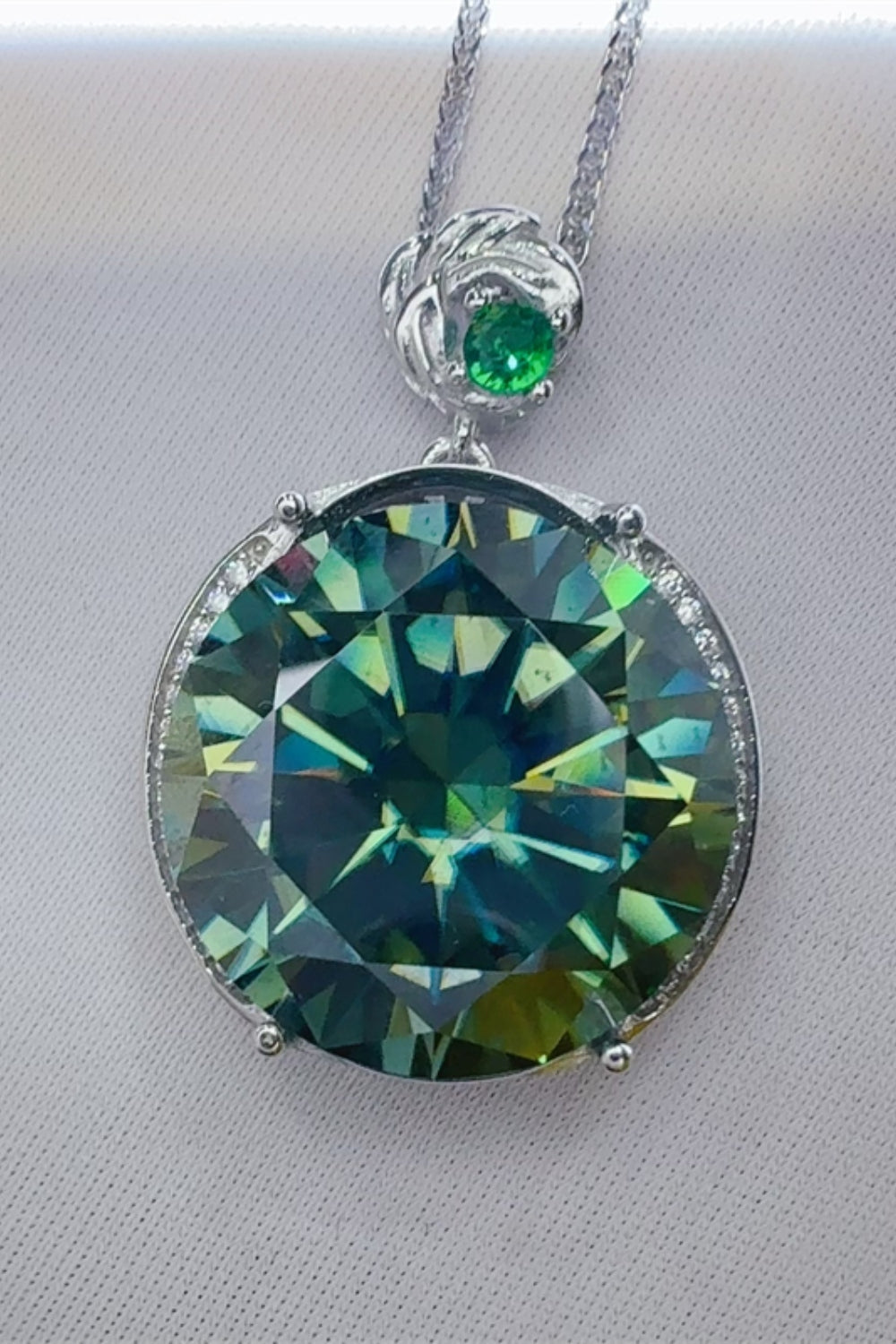 20 carat moissanite pendant necklace with large round green gemstone and silver chain from Trendsi